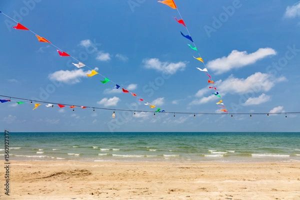 Fototapeta Colorful flags on a beautiful tropical beach on Koh Chang island