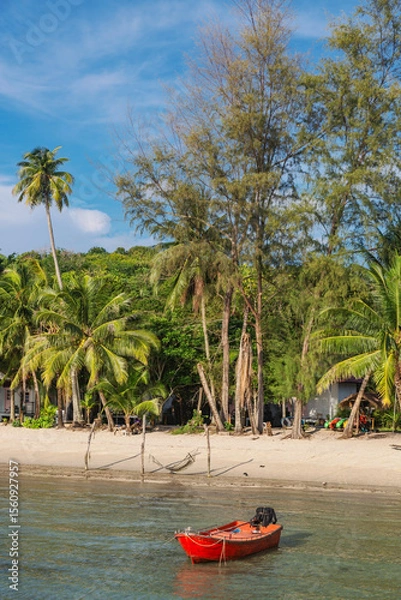 Fototapeta Beautiful landscape with kayak and palm trees and low tide sea at Bang Bao Bay, Koh Kood island