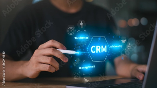 Fototapeta Businessman showing customer relationship management concept, CRM ,strategy or software to follow up on sales ,Customer relationship building ,creating satisfaction and confidence for customers
