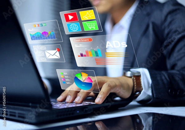 Fototapeta Digital marketing advertisement concept with businessman working on laptop computer to check advertisement dashboard on digital market platform