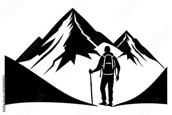 Fototapeta Silhouette of a hiker with a backpack and trekking pole standing before jagged snow capped mountains