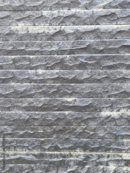 Fototapeta loosely arranged rocks used for building fences background texture