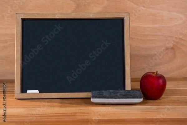 Obraz Blackboard with duster and apple