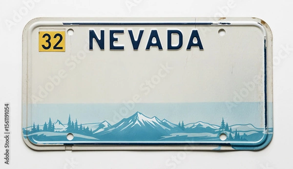 Fototapeta Nevada license plate with "Text space" against a mountain and tree background. Yellow decal 32 on top left corner. Clean, simple design