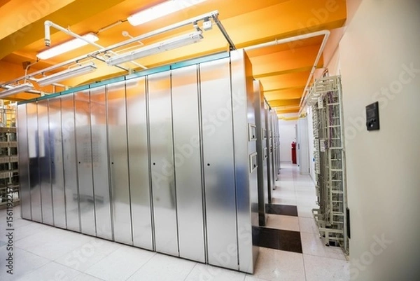 Obraz Server racks featuring cable trays, fluorescent lights, patch panel and extinguisher, flat design