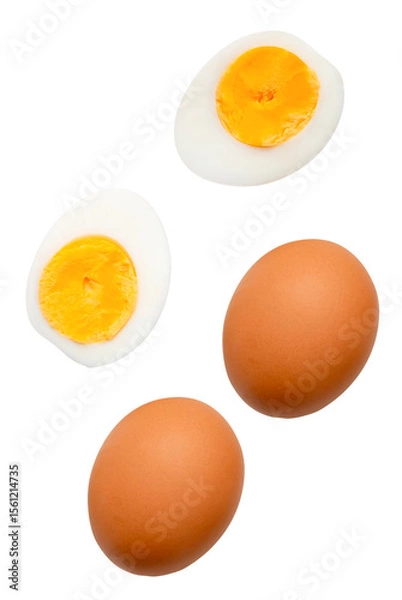 Fototapeta Top view set of two raw chicken eggs and cooked or boiled egg with egg yolk in two halves isolated on white background with clipping path