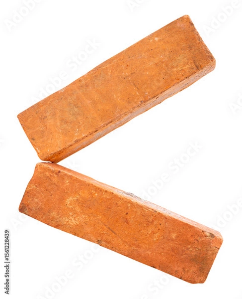 Fototapeta Side view of two cracked old red or orange bricks in stack isolated on white background with clipping path