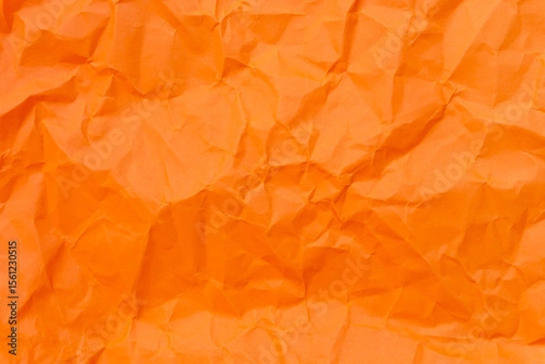 Fototapeta Top view and full frame of wrinkled or crumpled orange paper used as crumpled orange paper background texture.