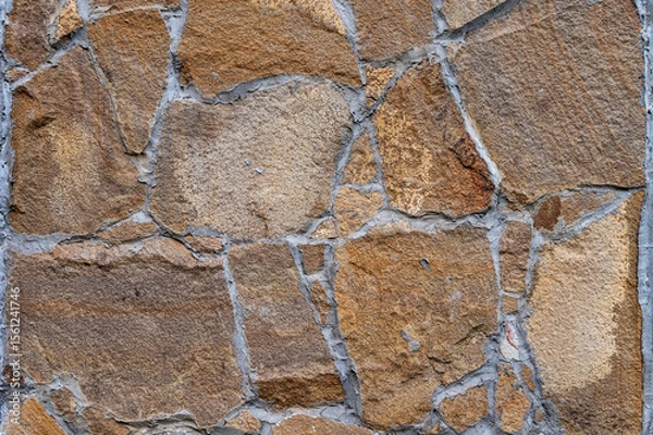 Fototapeta Texture of wall lined with natural stone. Template, background or wallpaper sample.