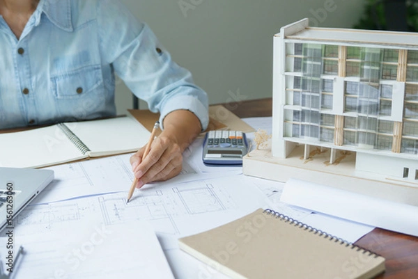 Fototapeta Architecture drawing on architectural Creative project business architecture building construction Industrial engineering.