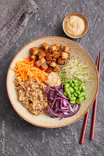 Fototapeta Quinoa edamame tofu bowl with red cabbage and carrots