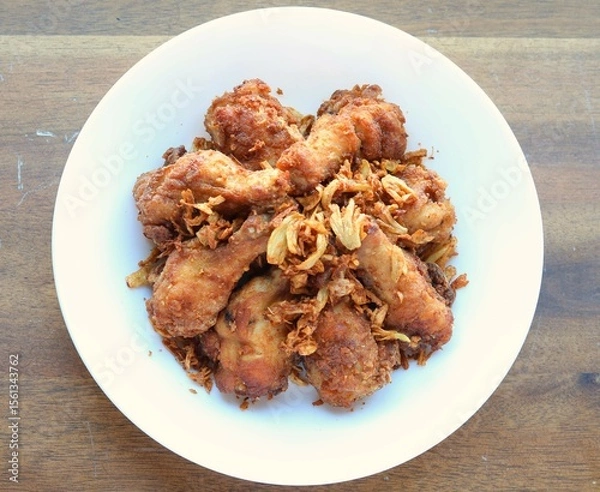 Obraz Golden brown fried chicken drumsticks