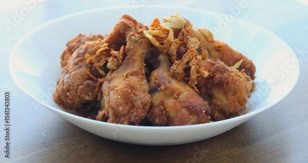 Obraz Golden brown fried chicken drumsticks