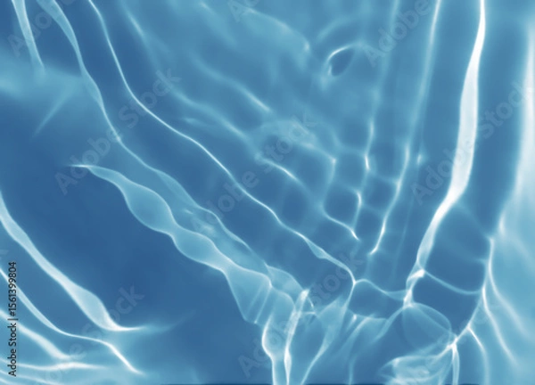 Obraz Abstract blurred shades of blue water background. Light and shadow ripples or splashes surface of water texture. Water waves with shining and reflection pattern photography for​ design artwork.