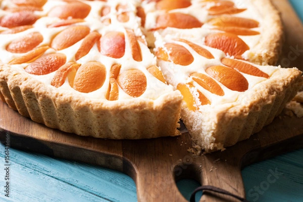 Fototapeta beautiful, appetizing apricot pie with cottage cheese