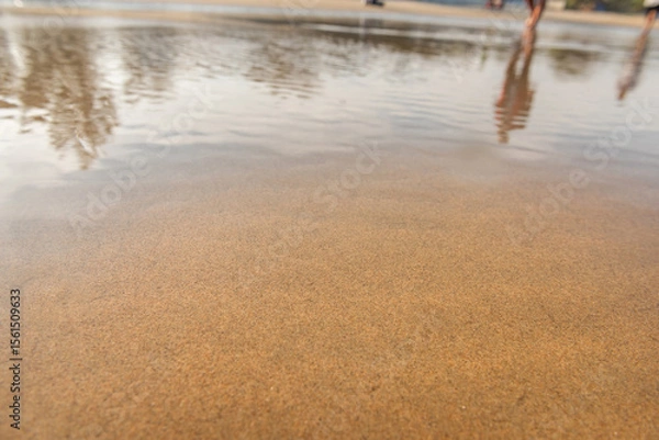 Obraz waves crash on the beach sand for background