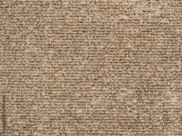 Fototapeta Close-up abstract background of beige modern carpet.