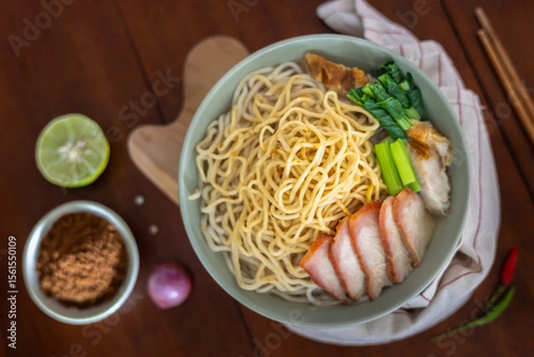 Fototapeta A close-up of Braised noodle soup with roasted red pork.