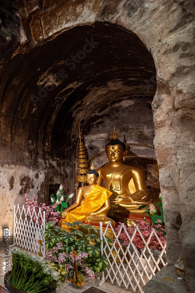 Fototapeta The ancient Buddha in the tunnel at Wat Umong.