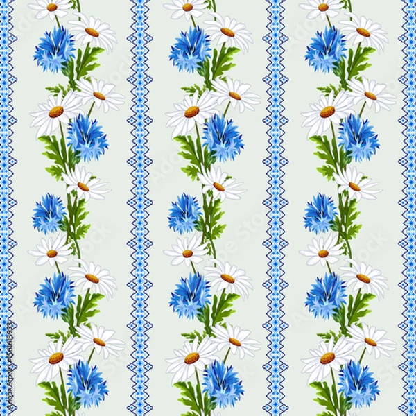 Obraz Chamomile and cornflowers in a pattern.Cornflowers and daisies in a vector seamless pattern on a light background with an openwork pattern.