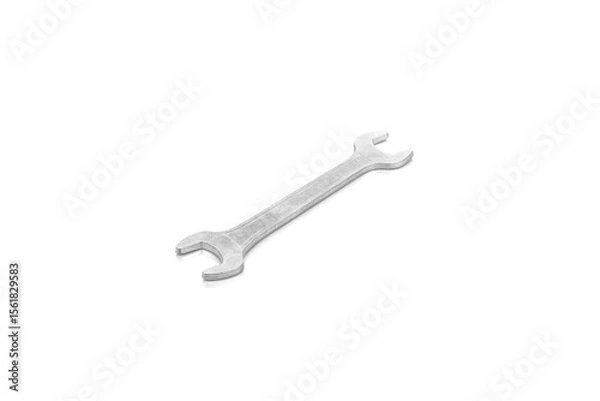 Fototapeta Metal double open-end spanner wrench, a classic hand tool for mechanical tasks, isolated on white background with clipping path.