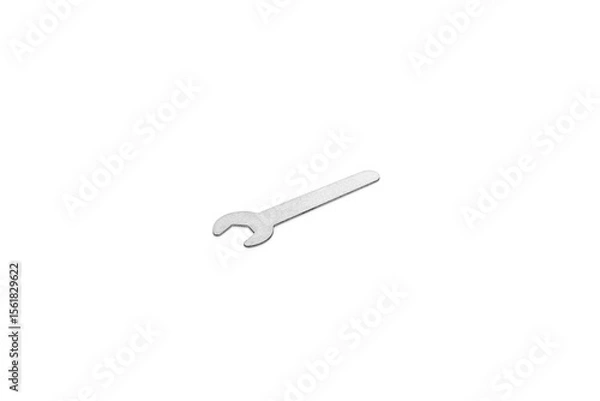 Fototapeta Small silver open-end wrench, a miniature hand tool or component, isolated on white background with clipping path. Ideal for precision work or flat lay designs.