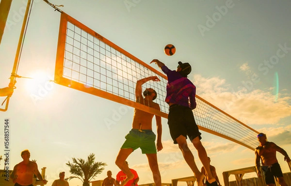 Fototapeta silhouette of beach Volleyball player on the beach in sunset