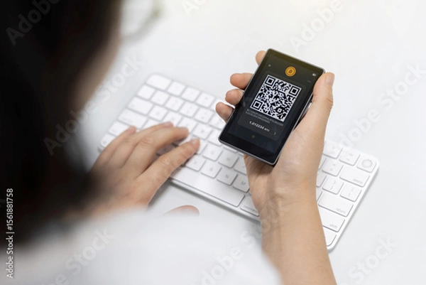 Obraz 암호화폐 콜드월렛(지갑)을 이용하여 코인을 전송하는 손