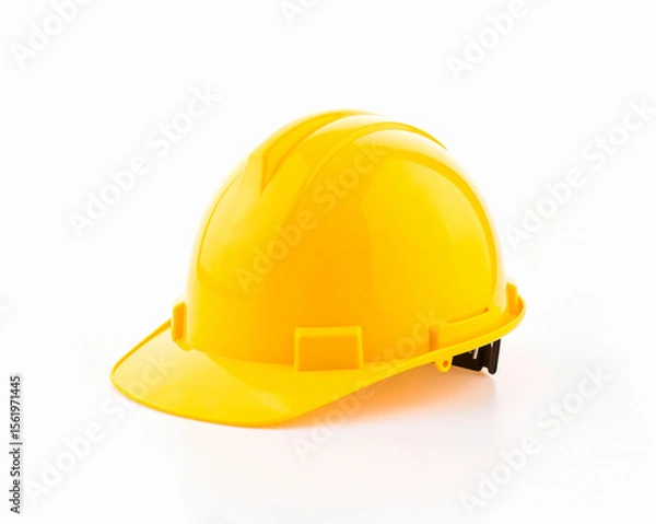 Fototapeta Yellow Construction Safety Helmet Isolated on White Background – Symbol of Industrial Work, Engineering, Site Safety, and Manual Labor Equipment