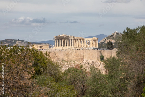 Obraz View of the Acropolis through branches of bush, Athens