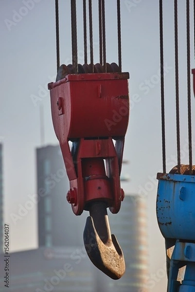 Fototapeta Old Crane Hooks in a Harbor