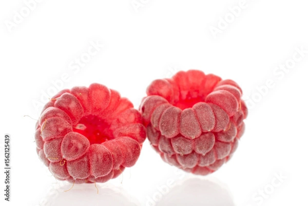 Fototapeta Fresh sweet raspberries isolated on white background, macro.