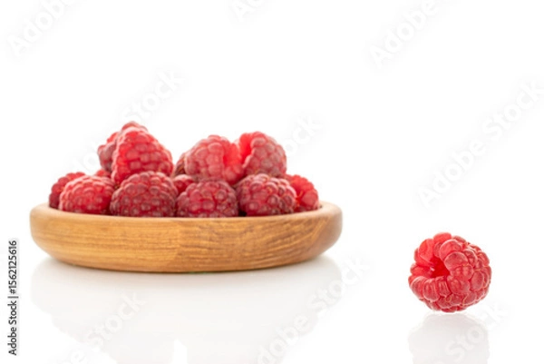 Fototapeta Fresh sweet raspberries isolated on white background, macro.