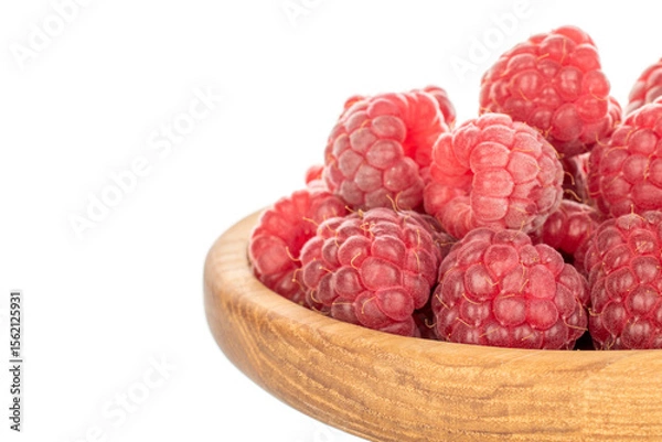 Fototapeta Fresh sweet raspberries isolated on white background, macro.