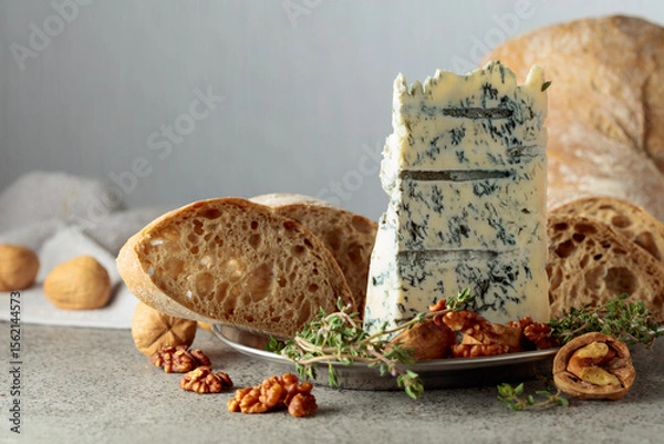 Obraz Gorgonzola with ciabatta, walnuts, and thyme.