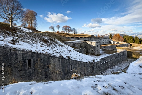 Obraz Entrance front of Fort Leone. In the foreground the wall and the ditch for close defense. Mount Cima Campo, Arsiè, Belluno, Veneto, Italy.