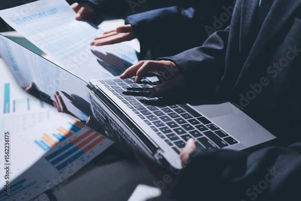 Obraz Two business people analyzing the data