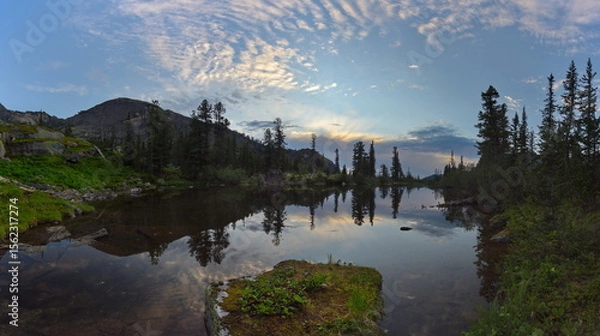 Fototapeta Russia. Krasnoyarsk Territory, Eastern Sayans. Summer evening on the shore of the Azure mountain lake in the natural mountain park Ergaki.