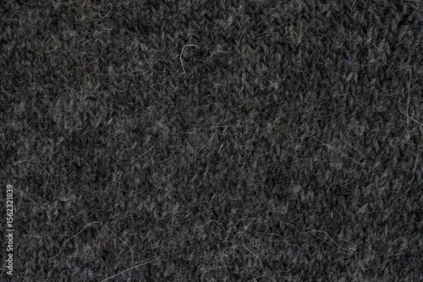 Obraz Texture of dark gray knitted fabric displayed in close-up view for textile examination