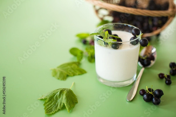 Obraz Aesthetic serving of yogurt with blackcurrant berries