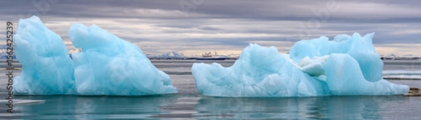 Obraz Blue icebergs floating in the Arctic