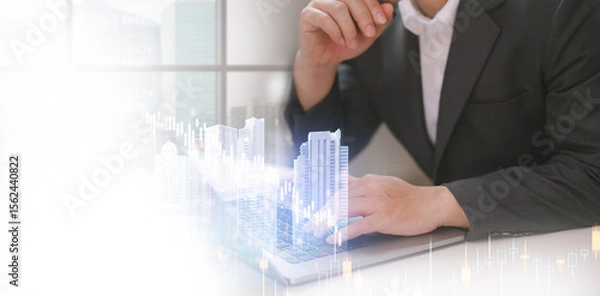 Fototapeta professional using a laptop for analysis about business real estate properties online showing digital transformation in the housing market. Real estate property search, finance industries.