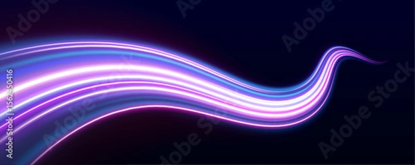 Fototapeta Neon beams speed down a dark road, creating a sense of endless movement. The vibrant colors and glowing lights emphasize the fast pace of modern technology.	