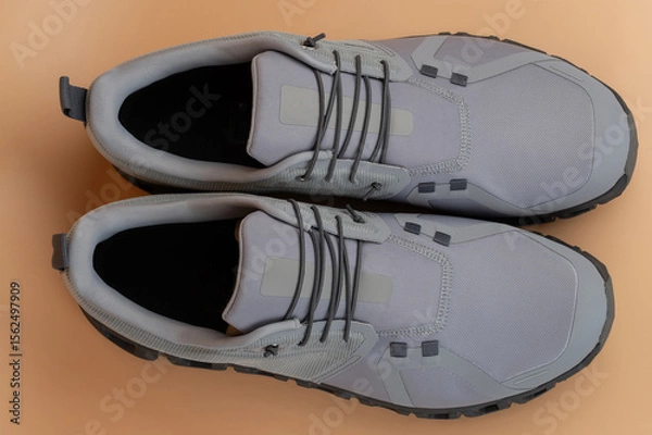 Obraz Stylish gray athletic shoes designed for comfort and performance during workouts