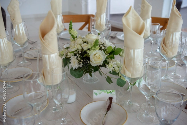 Fototapeta elegant banquet tables prepared for a conference or a party indoors