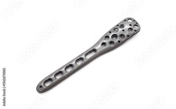 Fototapeta Proximal Humerus plate on white background with multiple holes for screw insertion for lengthening to treat fractures