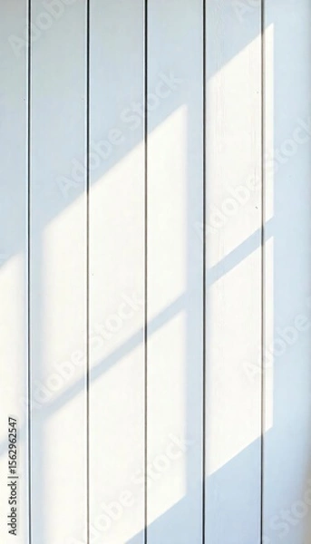 Fototapeta Sunlight Shadow Pattern on White Vertical Wood Paneling Wall Texture Background