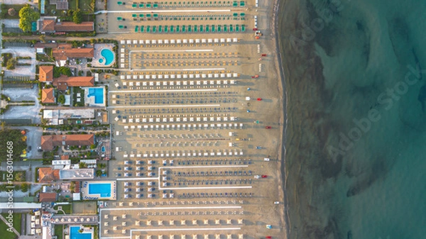 Obraz Viareggio tourist resort, Italy, aerial view. Pools, umbrellas and sun loungers on the beach, Tyrrhenian Sea.
