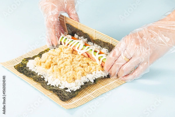 Obraz Close up of the process of making delicious sushi