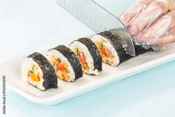 Obraz Close up of the process of making delicious sushi